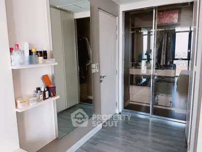 Modern bedroom with sleek wardrobe and stylish decor
