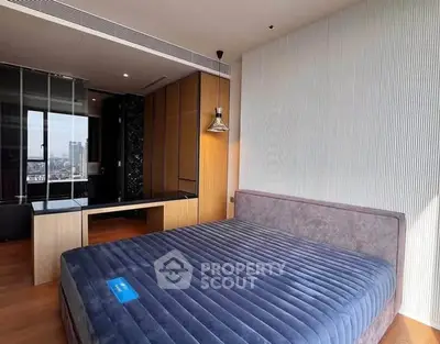 Modern bedroom with stylish decor and city view in luxury apartment