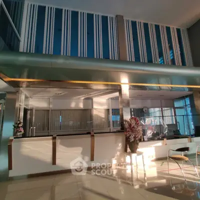 Modern building lobby with sleek design and natural lighting