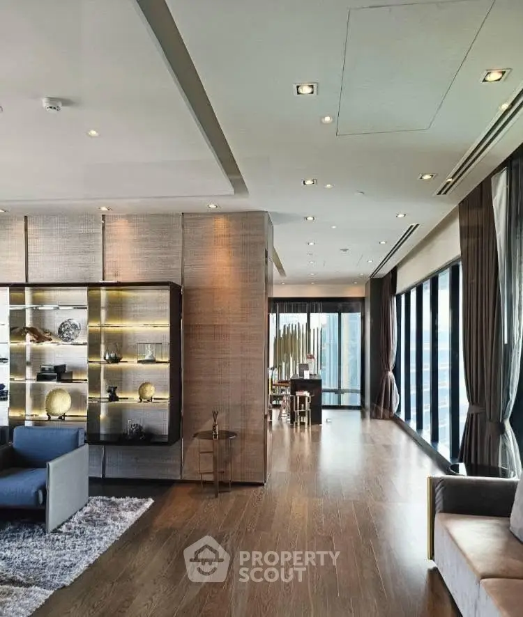 Luxurious modern living room with floor-to-ceiling windows and elegant decor
