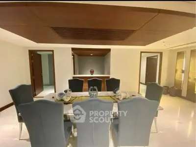 Elegant dining room with modern decor and plush seating