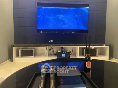 Modern living room with sleek entertainment setup and stylish decor
