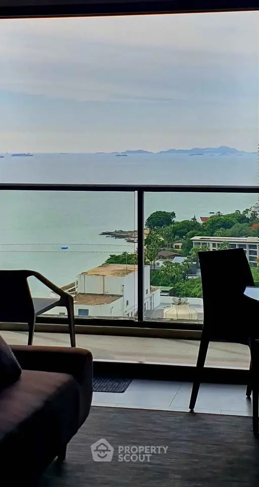 Stunning ocean view from a modern apartment balcony, perfect for relaxation and enjoying the serene coastal scenery.