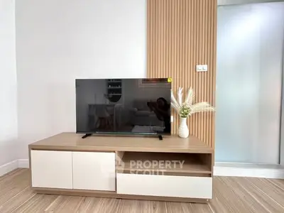 Modern living room with sleek TV stand and stylish decor