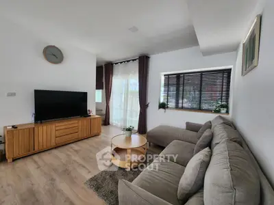 Spacious modern living room with stylish furniture and natural light