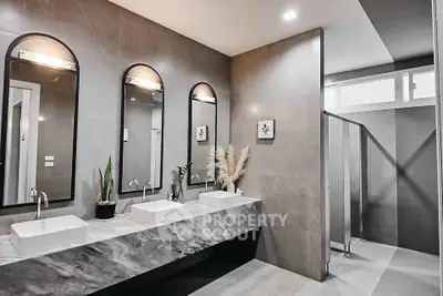 Elegant modern bathroom with dual sinks and stylish decor