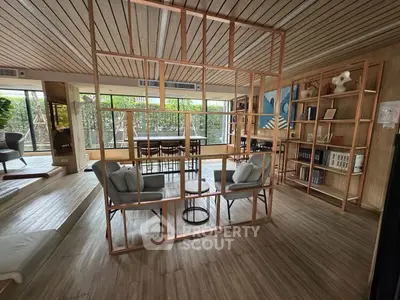 Stylish modern living room with open layout and wooden accents