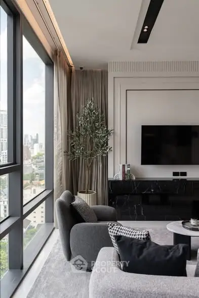 Luxurious modern living room with panoramic city view and elegant decor