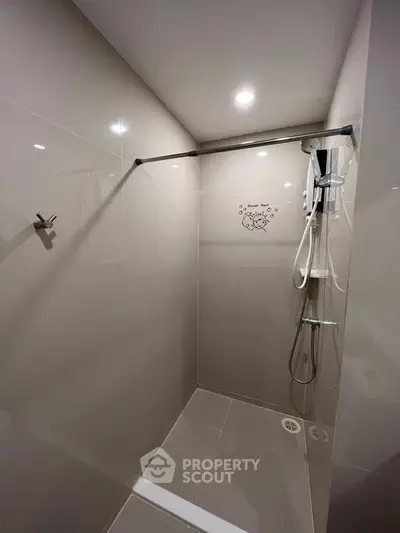 Modern bathroom with sleek shower design and elegant tile work