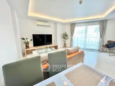 Spacious modern living room with large windows and elegant decor