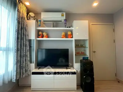 Modern living room with stylish entertainment center and air conditioning