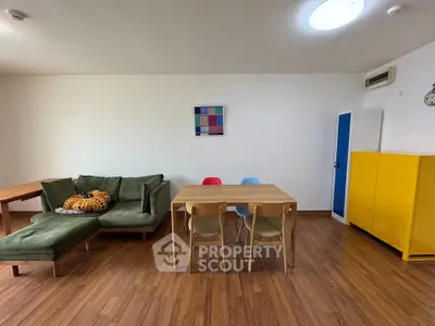 Spacious living room with modern furniture and vibrant decor