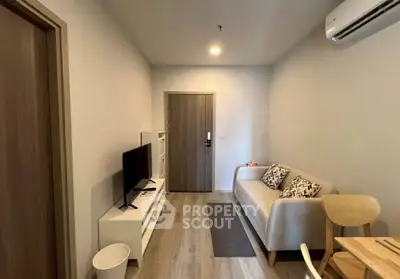 Cozy modern living room with TV and air conditioning