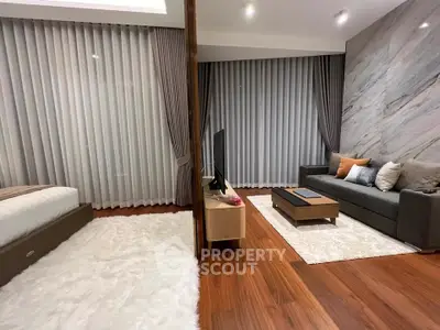 Luxurious modern living room with elegant decor and cozy ambiance