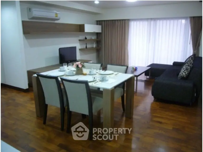 Spacious modern living room with dining area and stylish furniture