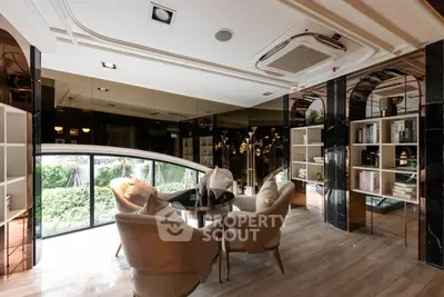 Luxurious living room with elegant decor and garden view, featuring plush seating and modern design.