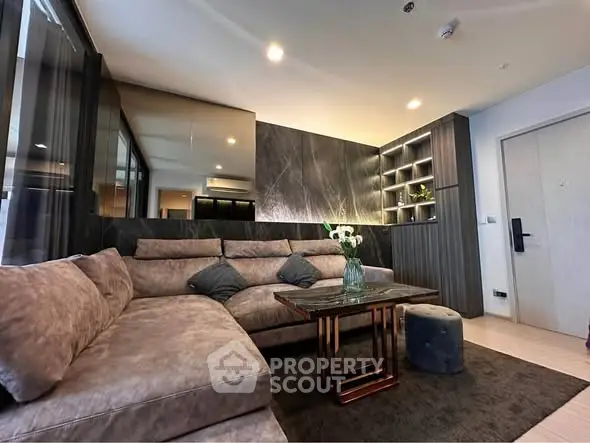 Modern living room with stylish sectional sofa and elegant decor