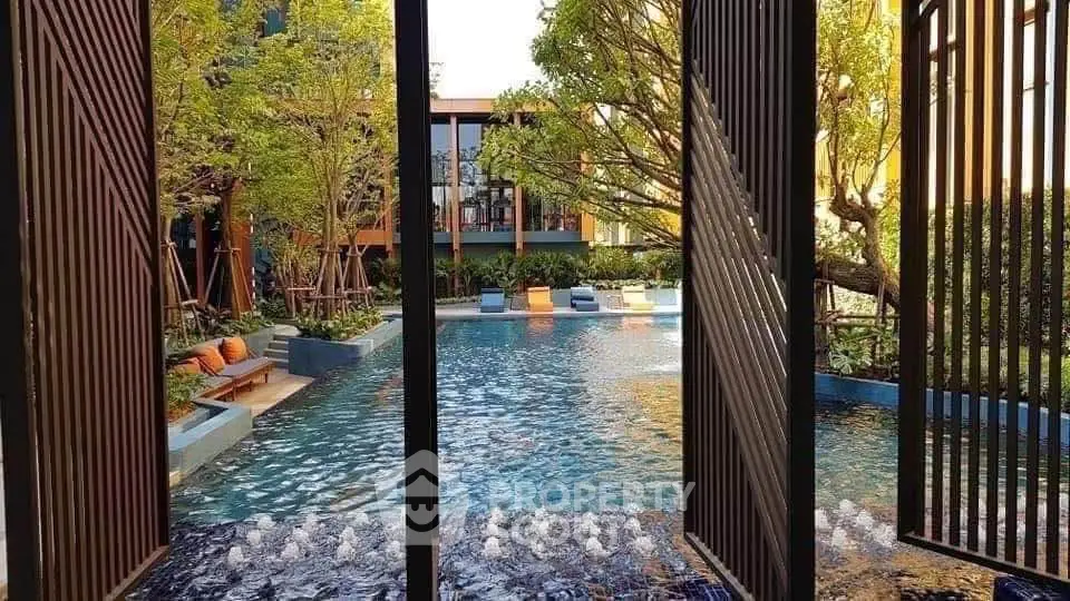 Luxurious poolside view with lush greenery and modern design