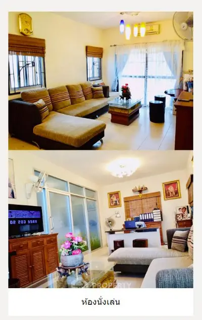 Spacious living room with modern decor and large windows for natural light.