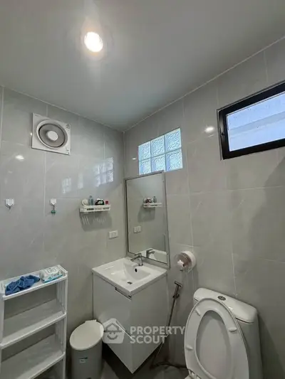 Modern bathroom with sleek fixtures and natural light