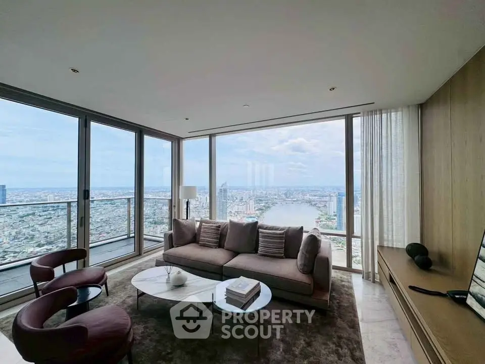 Luxurious living room with panoramic city view and modern furnishings