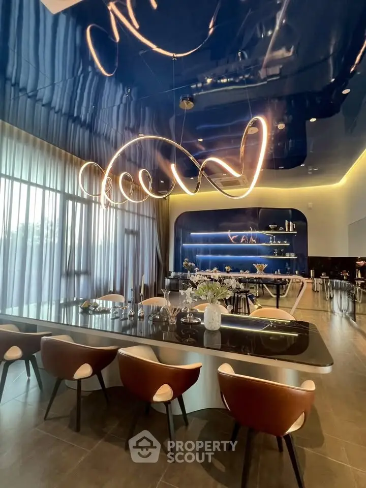Luxurious modern dining area with elegant lighting and stylish decor