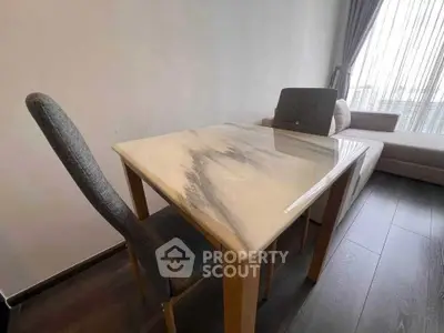 Modern living room with elegant marble table and stylish seating