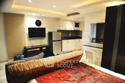 Modern studio apartment with open kitchen and stylish decor