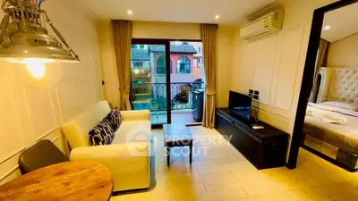 Charming living room with cozy sofa, modern lighting, and balcony view in stylish apartment.