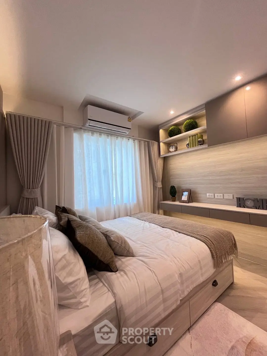 Cozy modern bedroom with stylish decor and natural light