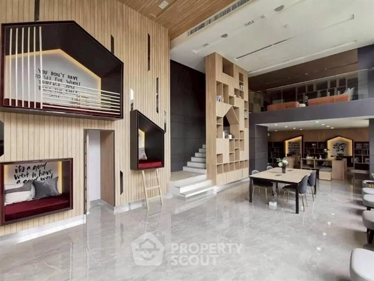 Luxurious modern living room with high ceilings, elegant decor, and stylish furniture in a contemporary apartment.
