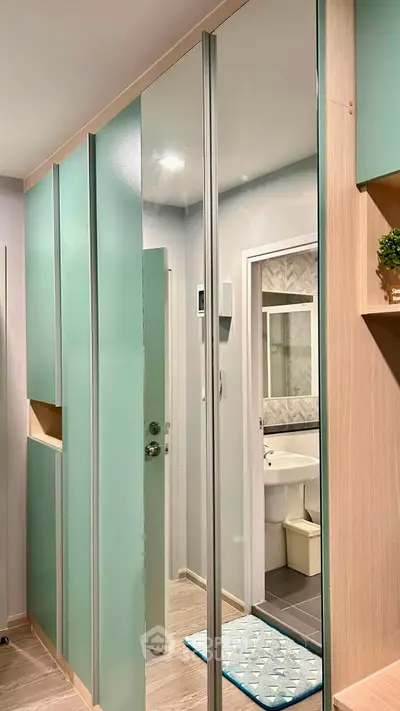 Modern bathroom with sleek cabinetry and stylish mirror design