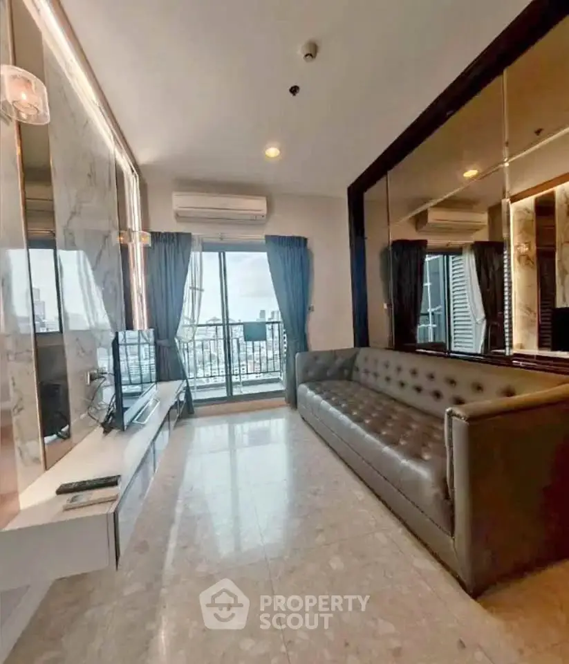 Modern living room with city view, featuring sleek sofa and elegant decor.