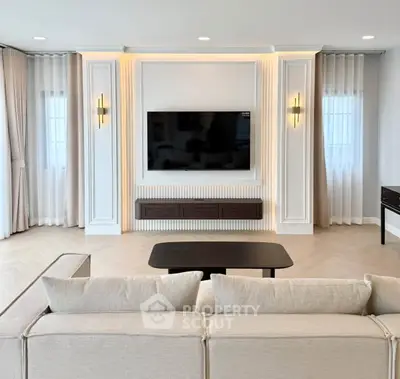 Elegant living room with modern TV setup and stylish decor