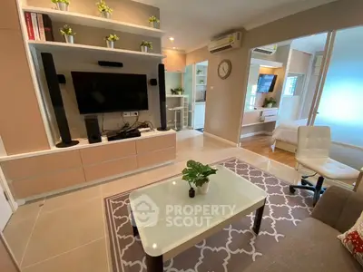 Modern living room with sleek furniture and open layout, perfect for relaxation and entertainment.