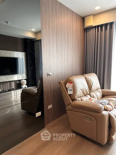 Luxurious living room with plush leather recliner and modern decor