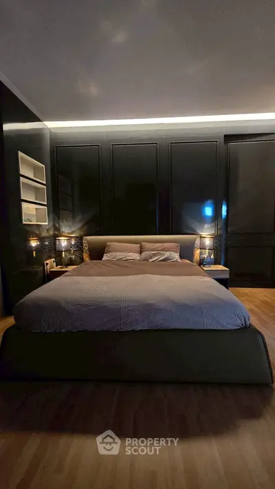 Luxurious modern bedroom with elegant lighting and stylish decor