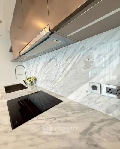 Luxurious modern kitchen with marble countertops and sleek appliances