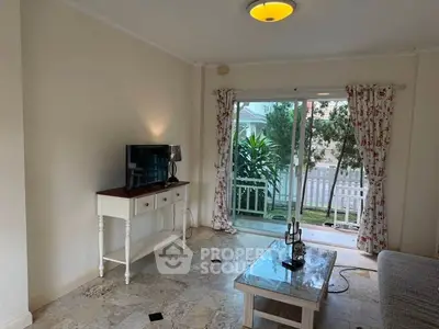 Charming living room with garden view and elegant decor