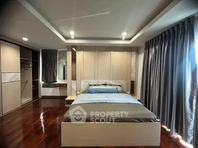 Luxurious bedroom with modern design and elegant lighting