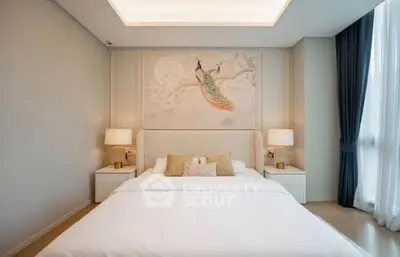 Luxurious bedroom with elegant decor and large window for natural light