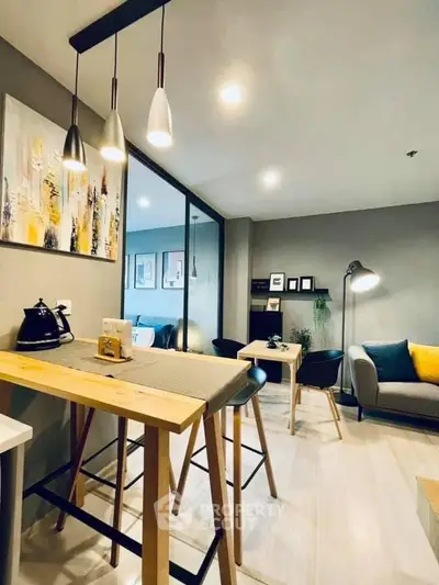 Modern living room with stylish decor, open layout, and cozy seating area, perfect for urban living.
