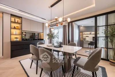 Modern dining room with elegant lighting and stylish decor in a contemporary apartment.