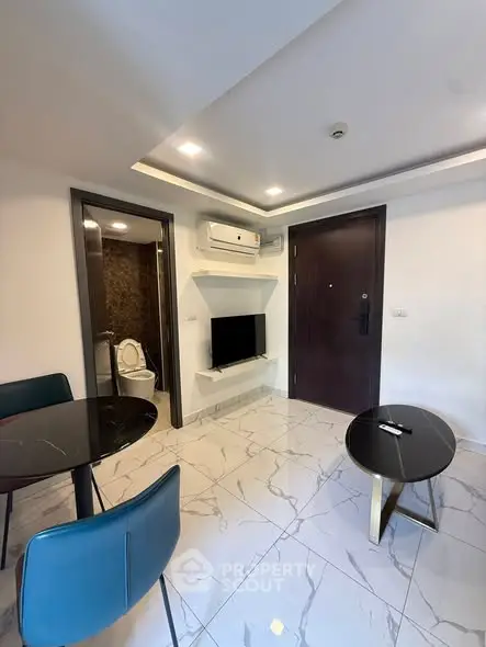 Modern living room with sleek design and marble flooring