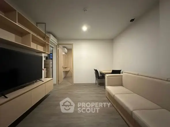 Modern living room with sleek furniture and open layout, perfect for contemporary living.