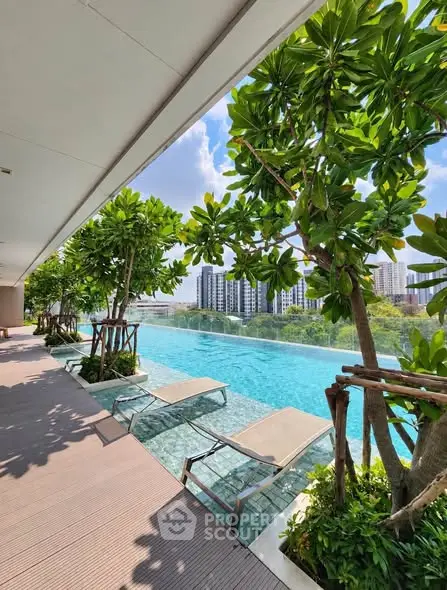 Luxurious rooftop pool with stunning city view and lush greenery