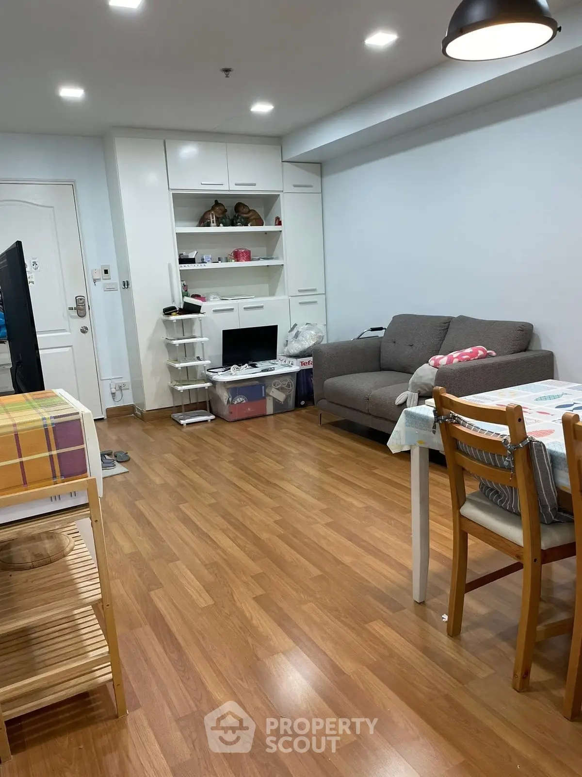 Cozy living room with wooden flooring and modern furniture