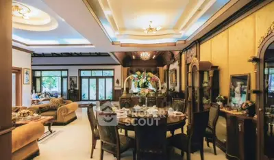 Luxurious living room with elegant dining area and classic decor