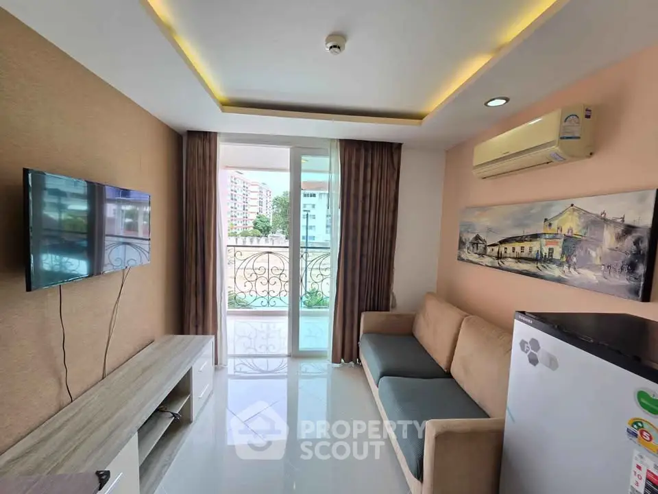 Modern living room with balcony view, stylish decor, and air conditioning.