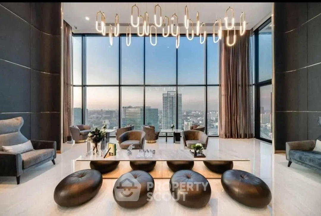 Luxurious high-rise living room with panoramic city views and elegant modern decor.